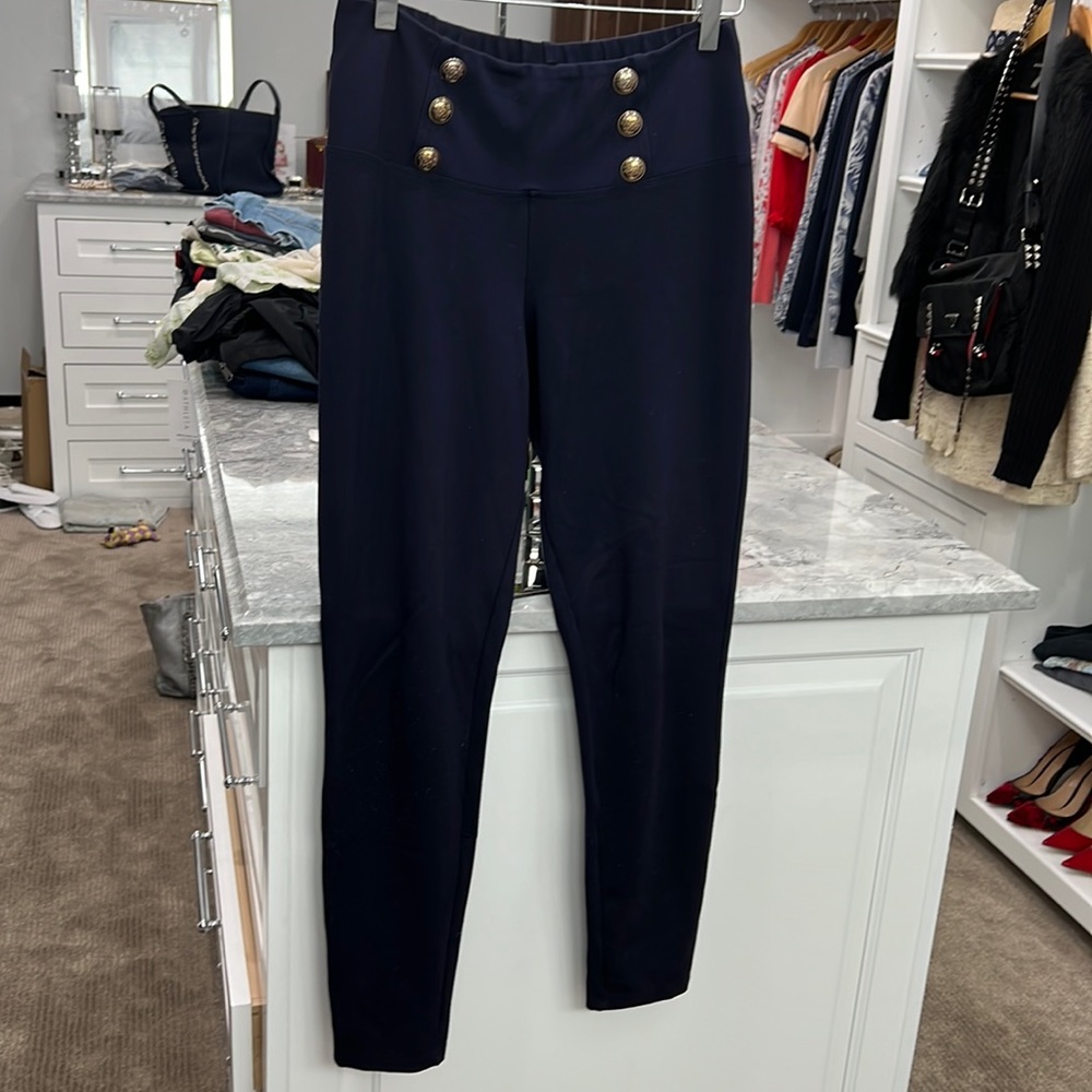 Navy blue leggings with gold buttons